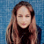 A pixelated image of a person with long brown hair wearing a dark turtleneck against a blue tiled background, next to green text reading "Original Icons .com" on a solid green field.