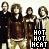 A 2x2 contact sheet of four animated frames showing a band with long hair and dark clothing, each frame featuring the text "HOT HOT HEAT" in pixelated font over their torsos.