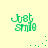 Green pixelated text 'Just smile' on light yellow background with scattered green dots in four quadrants.