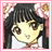 Pixelated anime-style character with long black hair and large brown eyes, wearing a white top against a pink border and blurred floral background.