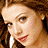 A contact sheet of three animated frames showing a woman with brown hair and red lipstick, above text reading "Ice Princess MARCH 18" on a light purple background.