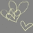 Pixelated light gray line art on dark gray background forms tangled loops and a separate heart shape.