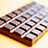 Pixelated chocolate bar image with blue text asking 'where would we be? without the most importantchocolate thing....' on a light blue background.