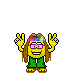 Pixelated cartoon character with brown hair, pink eyes, green pants, and a multicolored headband, making a peace sign with both hands against a gray background.