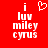 Red background with white pixelated text 'i luv miley cyrus' and a heart symbol above the text on the left side.