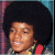 A 2x2 contact sheet of a pixelated animated icon featuring two distinct Michael Jackson images with overlaid text on the right side, displayed in green and pink colors against a black background.