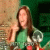 A woman in a green shirt appears in a of showing sequential hand gestures and facial expressions against a textured background