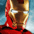 Iron Man's helmeted head with glowing blue eyes appears above a black displaying 'MAY 7' and '2' in gold text