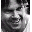 Six distinct pixelated portraits arranged in a , each showing different individuals with varied expressions and attire