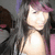 A person with long dark hair and a purple headband appears in three showing slight head movement