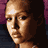 A 48x48 pixel animated contact sheet showing a woman in a white bikini top with diagonal stripes, displayed across four frames on a dark background.