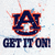 Pixelated icon with large orange-outlined dark blue 'AU' letters above dark blue 'ESTROM' text on light gray background with scattered colored pixels.