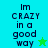 Pixelated text "Im CRAZY in a good way" on split background with star symbols, animated color shifts between cyan and green