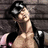Pixelated image of a shirtless person wearing black leather straps and a cap, with text "hold on tight" in blocky letters on an orange background.