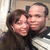 Two people pose closely together in a static image with no visible motion or text.