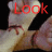 Red text overlays a repeated image of two hands holding each other against black background, with partial text fragments visible.