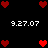 Pixelated red hearts and white date text on black background, with heart arrangements changing across frames.