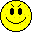 Four yellow pixelated smiley faces arranged in a , each with distinct facial features and expressions on a gray background