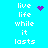 Pixelated text 'live life while it lasts' on cyan background with purple heart and starburst icons.