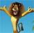 Pixelated lion with brown and tan fur stands against blue background, arms raised, mouth open showing purple tongue, tail curled downward.