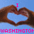 Two hands form a heart shape against a blue background with pink text reading 'I' above and 'WASHINGTON' below.