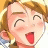 A 48x48 pixel buddy icon featuring a cartoon character with blonde hair and closed eyes on the left, next to black background text reading "Anime IM" above smaller stylized text "COM" on the right.