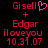 Two side-by-side pixelated text displays on black background, each showing 'Gisell + Edgar iloveyou 10.31.07' with red and pink characters; left display includes a pink heart symbol replacing the second 'l' in 'Gisell'.