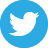 Blue circular background with white bird silhouette facing right, pixelated rendering, no text or additional elements.