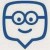 A pixelated blue speech bubble icon with a smiling face featuring large round glasses and two circular eyes.