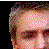Pixelated headshots of three men above bold white text on black background, with gray rectangle in bottom right.