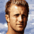 A 48x48 pixel animated contact sheet showing three frames of a man in swimwear against beach and water backgrounds with subtle expression changes.