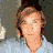 A static image of a person in three distinct with text overlays on the right side