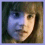 four shows a person with light brown hair in two facial expressions and the name 'Hermione' on black background