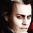 Pixelated image of a person with dark hair and red eyes, accompanied by red text reading "Sweeney Todd" and "Demon Barber of Fleet Street" on black background.