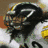 A pixelated animated sequence showing a football player in black and white gear, then two players in yellow jerseys with numbers 49 and 45, followed by a close-up of a helmet with number 49.
