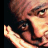 pixelated buddy icons with heart symbols and text, featuring a partial photo of a person's face in the top-left corner