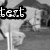 Black-and-white animated icon with pixelated text 'text' in three positions across showing a figure holding an object