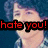 Pixelated image of a person with light skin and purple hair, wearing a blue top, with red text overlay reading 'hate you!' in bold letters.