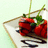 Pixelated image of two red cherries with green stems on a light-colored plate against a pale background.