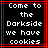 Black background with white pixelated text reading "Come to the Darkside we have cookies" framed by red lines