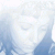 A static image of a person with closed eyes and light-colored hair, wearing a dark top with a choker necklace, set against a light blue background.