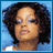 A 4-frame contact sheet of a pixelated animated icon featuring close-up shots of a person with curly hair and blue eyeshadow, alongside text reading "FEFE DOBSON" on a light blue background.