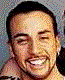 A single person's face appears in three distinct poses across a , with visible changes between frames
