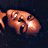 A 4-frame animated contact sheet showing a cartoonish figure with brown skin and orange hair in various poses against a dark background, featuring visible pixelation and dithering effects.