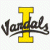 Static pixelated icon featuring a large yellow capital 'I' with black cursive text reading 'Vendel' overlaid diagonally across it on a transparent background.