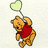 Winnie the Pooh character in red shirt holding light green balloon, with text elements above and below.