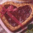 Heart-shaped gift box with red ribbon and Elmo holding a heart, text reads 'I Love You more then i love elmo<3'