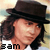 Animated contact sheet of a person with long brown hair wearing a dark fedora hat, displayed across six frames in a 3x2 grid layout.