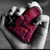 A hand holds a purple gift box with white ribbon; a broken heart with bandage; two cartoon figures with hearts; red background with yellow text 'Craig 11.22.08 forever<3'