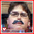 A split-frame contact sheet showing a pixelated portrait on the left and red text with a heart symbol on the right, both within a red border.